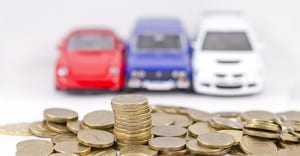 cars in background, coins in foreground