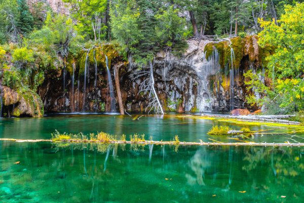 photo of clear green water and water falls at Hanging Lake in Glenwood Springs