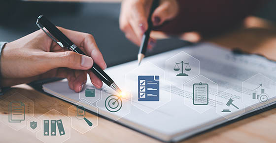 Loan review | document overview | discussion between two people | DWC CPAs and Advisors | business consulting, tax services, audit and assurance, estate and gift planning, wealth management, bookkeeping, outsourced accounting | Grand Junction CO | Montrose CO | Glenwood Springs CO