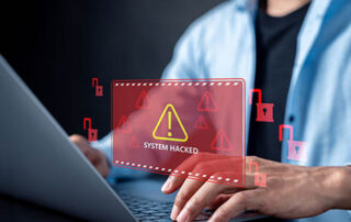 System hacked alert warning on laptop screen with red unlocked padlock icons, cyber attack, data breach, computer security threat, and information system.